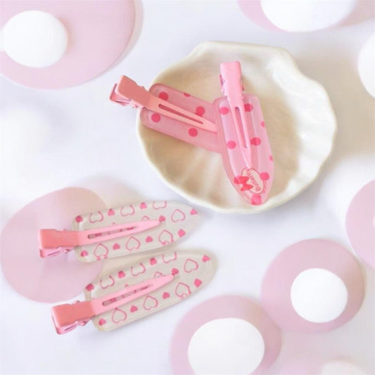 4 Hair Clips ٤ كلبسات شعر